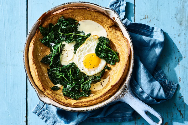 Rye puff pancake with greens & eggs