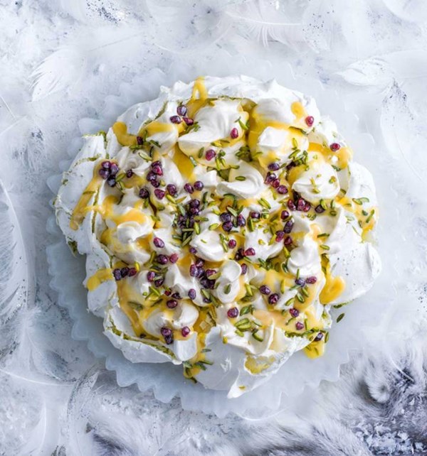 Saffron & pistachio Pavlova with citrus curd