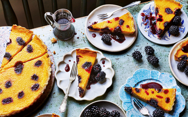 Saffron and bay custard tart with sticky blackberries