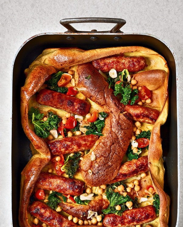 Saffron and chorizo toad-in-the-hole with sherry-braised kale and chickpeas 