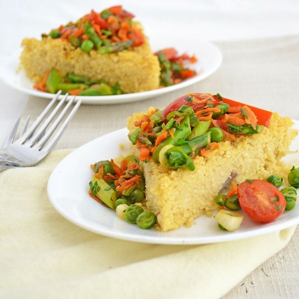 Saffron couscous cake with spring vegetable sauté