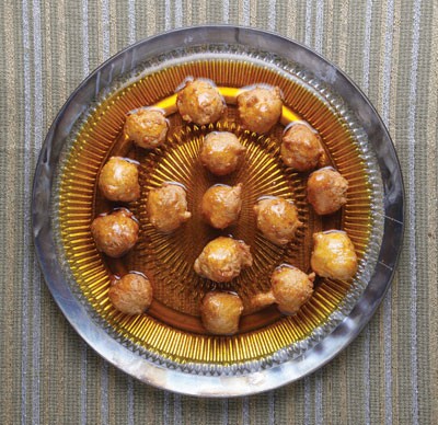 Saffron-flavored fritters (Lgeimat)