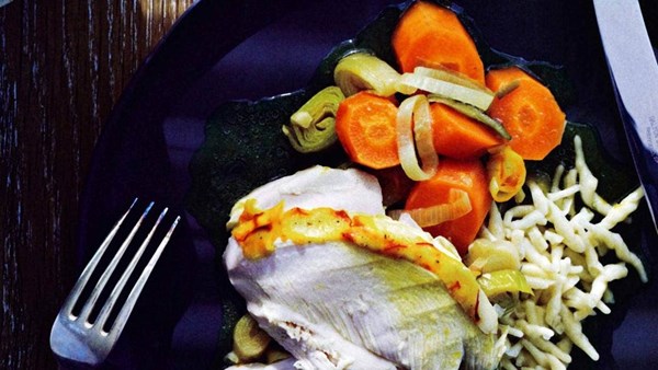 Saffron poached chicken with carrots and leeks