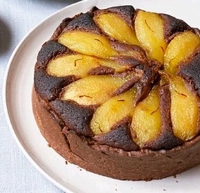 Saffron-poached pear brownie tart