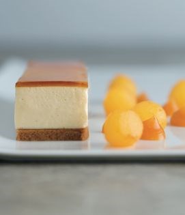 Saffron-poached pears with burnt honey cream and liquid puff pastry