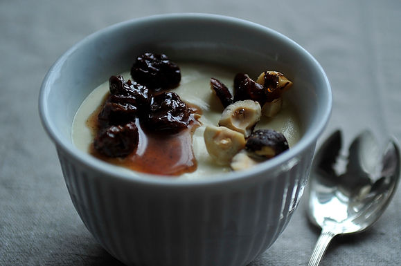 Saffron semifreddo with cherry-cardamom syrup and salted honey-hazelnuts