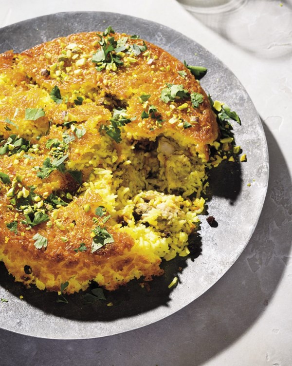 Saffron-spiced crispy rice with chicken and lemon zest