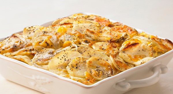 Sage & cheddar potato gratin