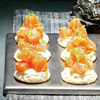 Sake and lime salmon blinis