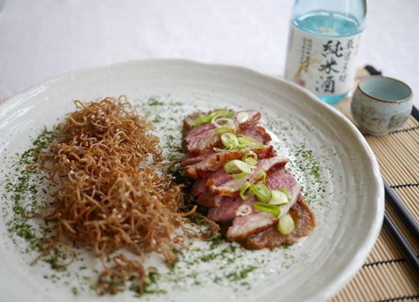 Sake-marinated lamb rump, aubergine and miso purée and crispy noodles