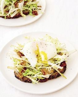 Salad Lyonnaise tartine with poached egg