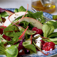 Salad of feta, toasted pumpkin seeds and crushed raspberries 