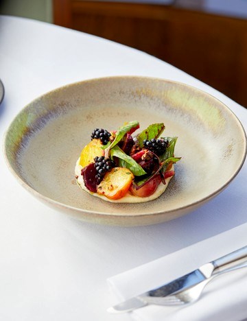 Salad of heritage beetroots, goat's curd and blackberries