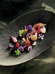 Salad of pink, red and golden beetroot with fig, goat's curd cylinder and truffle honey