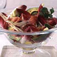 Salad of red chicory, fennel, avocado and prosciutto 