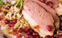 Salad of smoked duck with farro, red chicory, and pomegranates