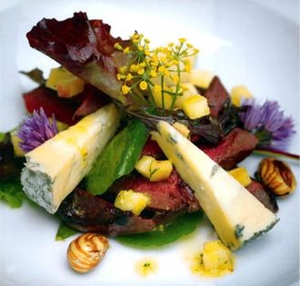 Salad of wood pigeon with Yorkshire blue cheese, warm cobnut and russet dressing and greengage ‘spritzer’