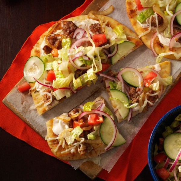 Salad-topped flatbread pizzas