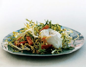 Salad with Canadian bacon and poached eggs