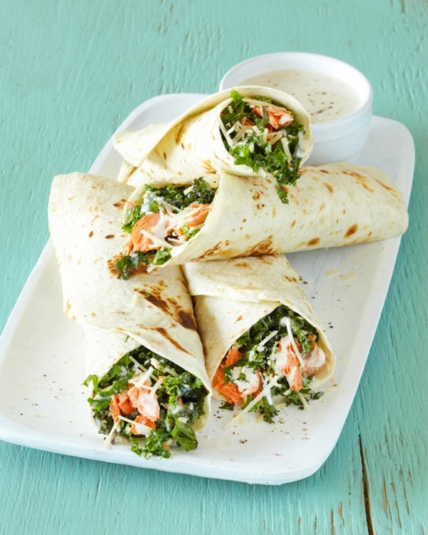 Salmon and kale Caesar wraps