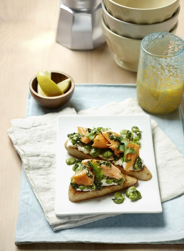 Salmon and mint crushed broad beans on ricotta and grilled bread