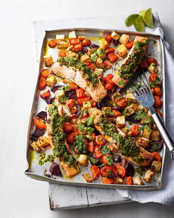 Salmon and root vegetable traybake with quick coriander pesto