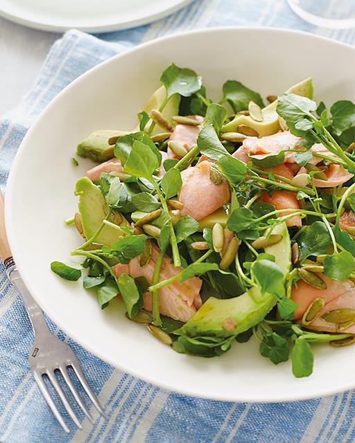 Salmon, avocado, watercress salad with pumpkin seeds