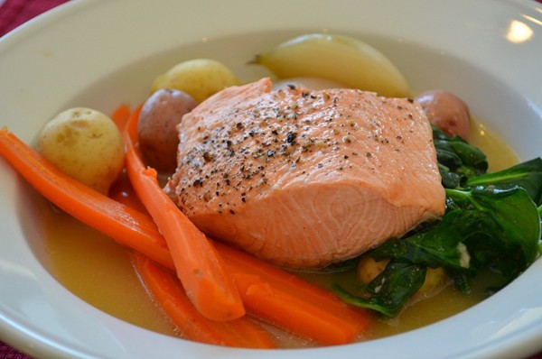 Salmon bowl with carrots, spinach, and potatoes