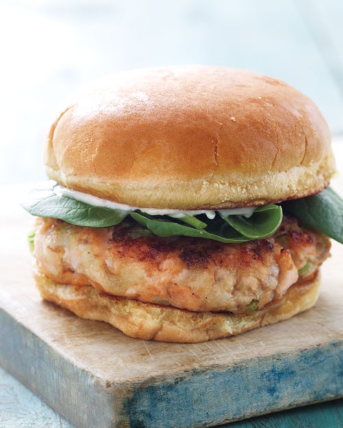 Salmon burger with baby spinach