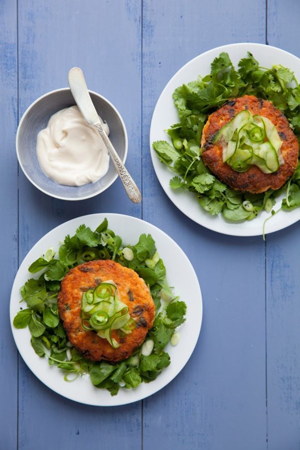 Salmon burgers with fresh herbs and pickled cucumbers
