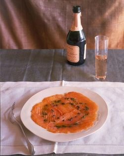 Salmon carpaccio with extra-virgin olive oil and balsamic vinegar