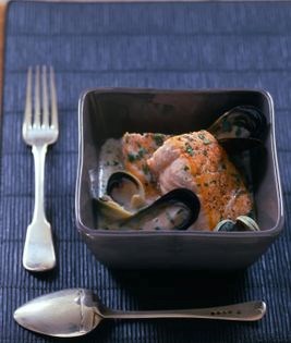 Salmon fillets with shellfish and parsley broth