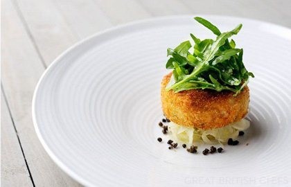 Salmon fish cakes with rocket, capers and lime dressing