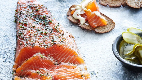 Salmon gravlax with Dijon crème fraîche dressing and pickled cucumbers