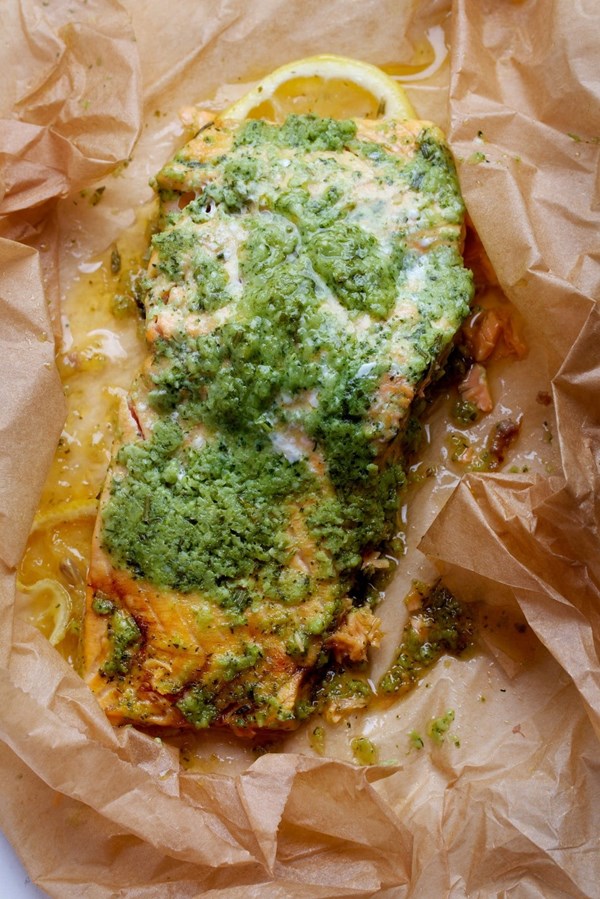Salmon in packets with green herb slather marinade