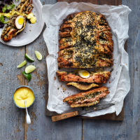 Salmon lattice with tea eggs and miso Hollandaise 