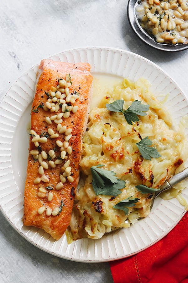 Salmon meuniere with Gruyere-roasted cabbage