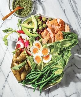 Salmon Niçoise salad with charred green onion pesto