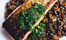 Salmon on lentils with herb relish