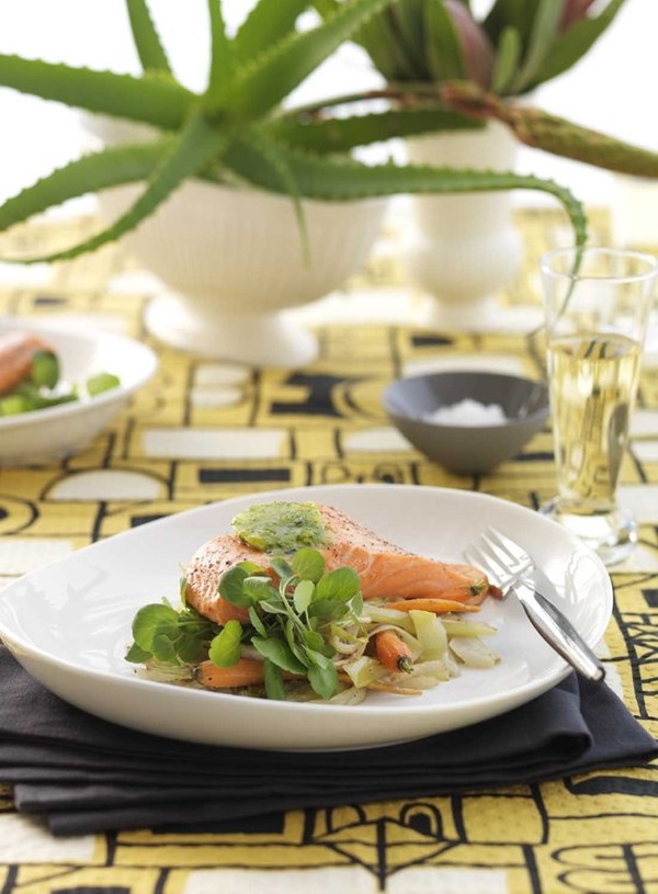 Salmon on roasted fennel and carrots with basil butter