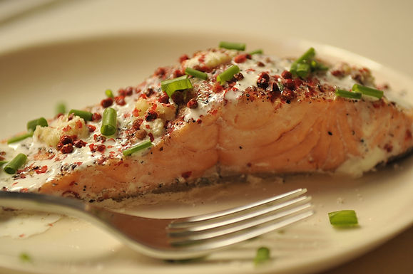 Salmon papillotes with red peppercorns, lime and fresh ginger
