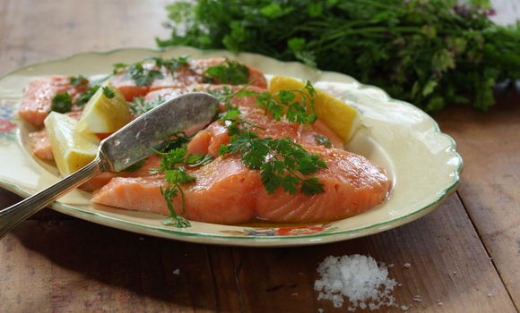 Salmon poached in extra virgin olive oil