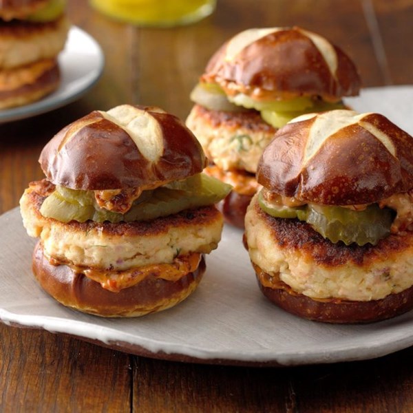 Salmon sliders with sun-dried tomato spread