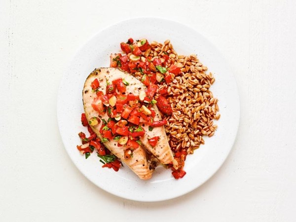 Salmon steaks with strawberry salsa and farro 