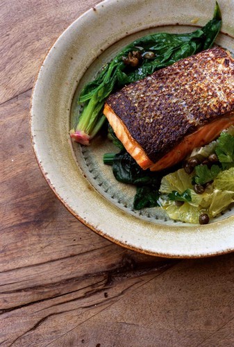 Salmon, steamed spinach and a lemon salad
