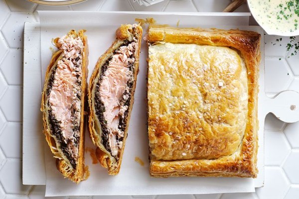 Salmon Wellington with white wine cream sauce
