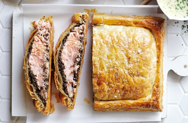 Salmon Wellington with white wine cream sauce