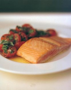 Salmon with a salted tomato and herb salad