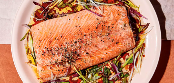 Salmon with citrussy charred spring onion