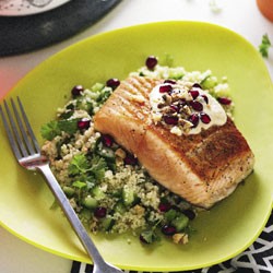 Salmon with cucumber couscous, chickpea sauce and pomegranate